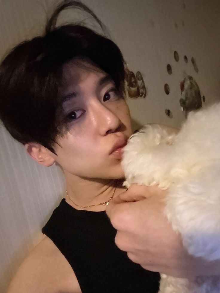 say hello to this sweet little white puppy. 🤍 i tried to match his cuteness for a photo, but he acted too cool to pose with me. guess i'll just have to be the cute one alone. :p