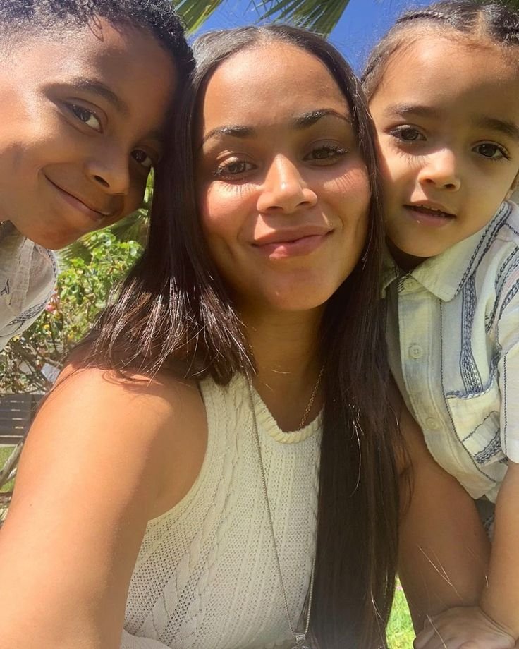 Lauren London and her children.

You can tell which one is Lil Wayne's &amp; which one is Nipseys.