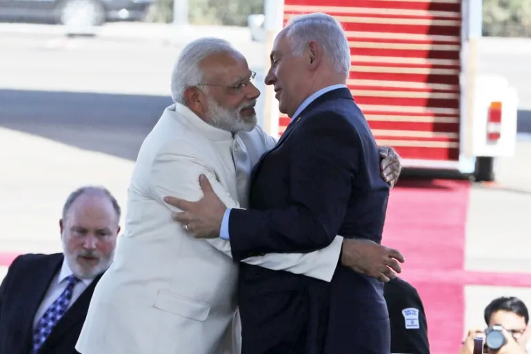 Nobody is talking about the most important variable in the strike timeline. It is not the deadline. It is not Geneva. It is not the carriers.

It is Narendra Modi.

Tomorrow, February 25, the Prime Minister of India lands in Tel Aviv for a two-day state visit. He will meet