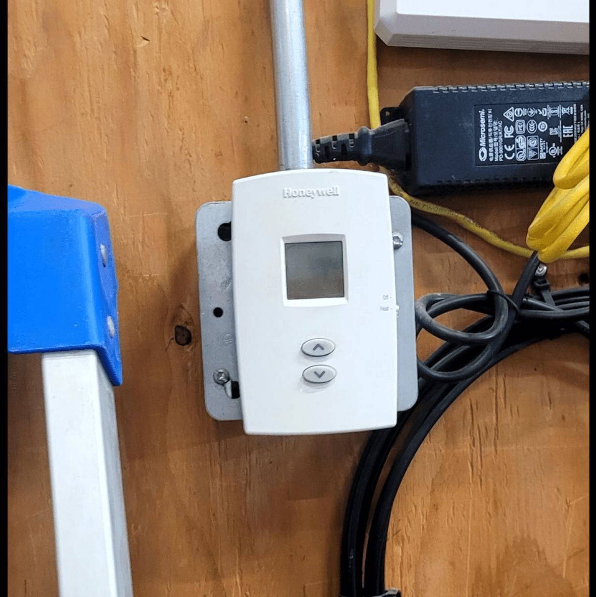 KrimpElectric's tweet photo. Cold snap. Dead thermostat. Part of a Diamond Valley car wash without heat. Replaced it with a new Honeywell Home unit — Heat On before we left. #DiamondValley #CommercialElectrical https://t.co/zoYjNm8vdk