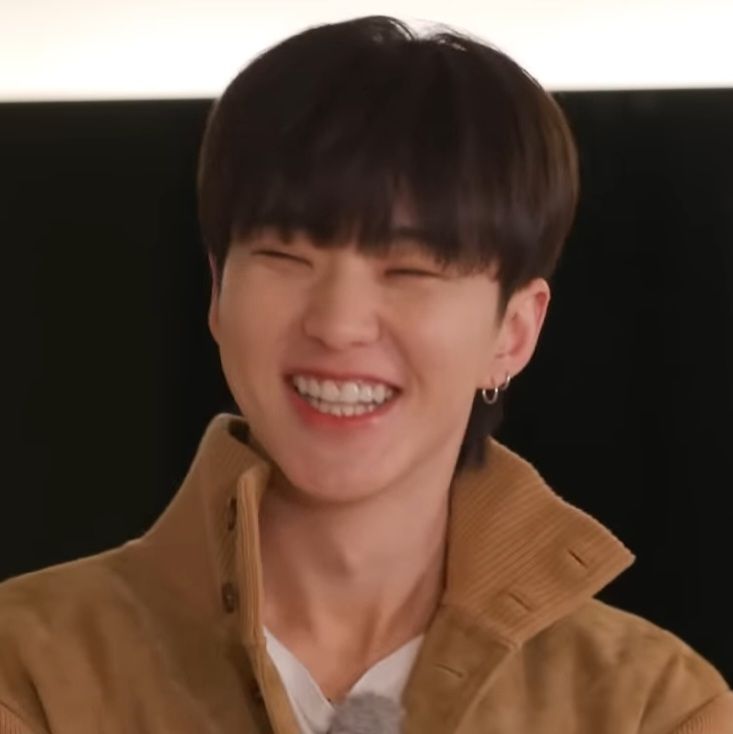 When his eyes squint every time he smile
