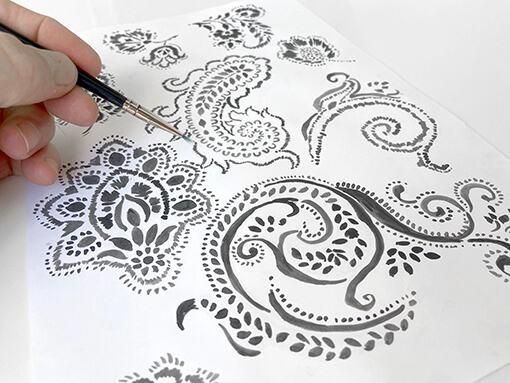Here's a photo of my original artwork. I painted the motifs by hand, scanned them, &amp; created repeating patterns in a range of colours. I painted more motifs to combine with these. I sent my designs to my agent yesterday. She replied, "Hi Pat, they look beautiful". #ArtistOnX