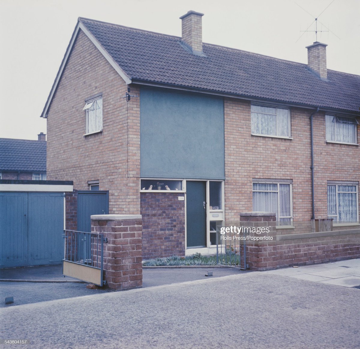 George Harrison's mum, Mrs Louise Harrison, in the kitchen of the Harrison family home at 174 Macket's Lane in Liverpool circa 1964. George Harrison lived in this house from 1962 to 1965. 
Photo by Rolls Press