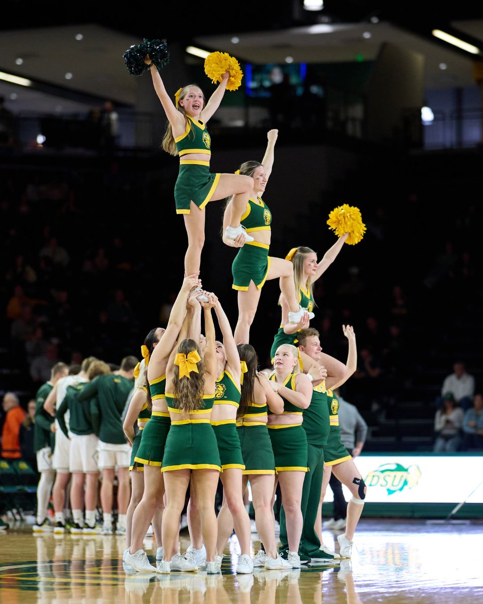 NDSUcheer's tweet photo. All season long, we’ve had the best view! 💛 Cheering on our Summit League Regular Season Champions has been an honor! Don't miss us this Saturday for our last home game this season! #NDSUCheerTeam #NDSUCheer #GoBison https://t.co/w6Xlkq7S1o