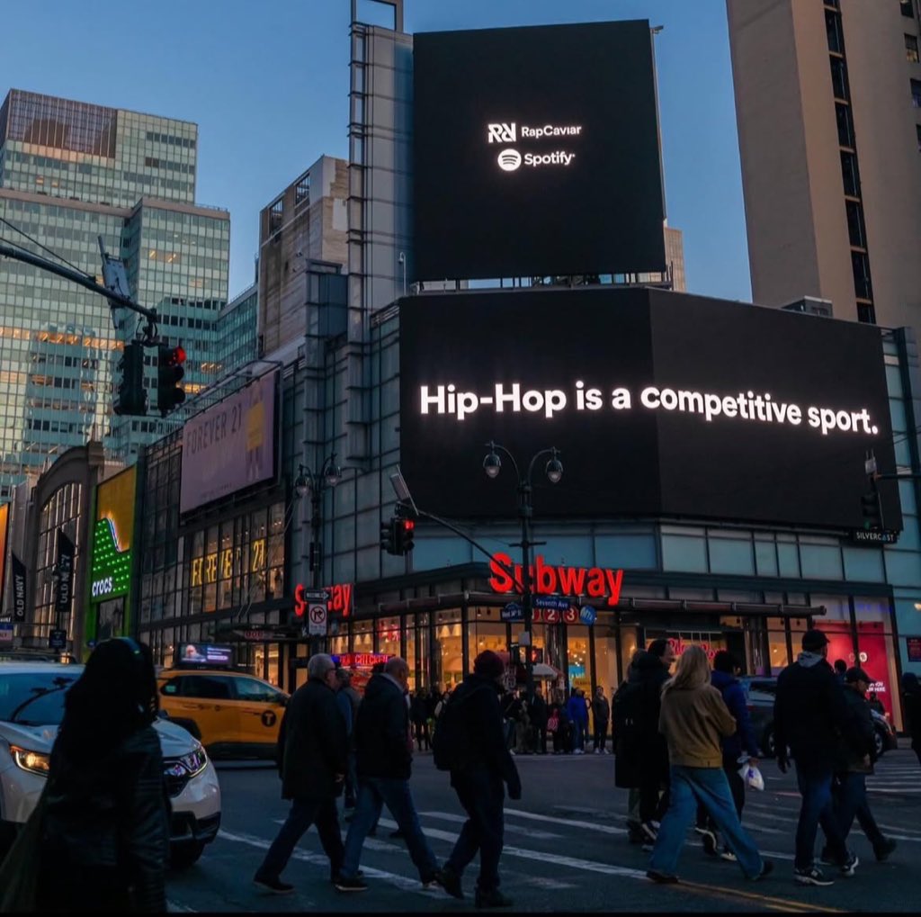 blassicliberal's tweet photo. Spotify should not be calling "Hip Hop a Competitive Sport", OR calling for Hip Hop's "New Leaders".

Spotify should be PAYING artists fairly instead of taking out dumb billboards. #rapcaviar #spotify https://t.co/yePx9YGeVa