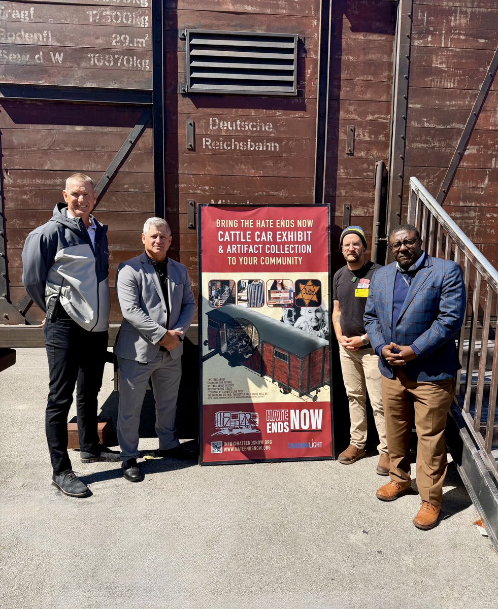DBHSpathfinder's tweet photo. #HateEndsNow Traveling Cattle Car Exhibit brought their immersive experience to #DeerfieldBeach campus.
#DBHS Principal Jon Marlow, @browardschools North Region Director Todd LaPace, Lead Educator Avery Bingaman, & North Region Director Jermaine Fleming posed in front of the car https://t.co/34leXKASBO