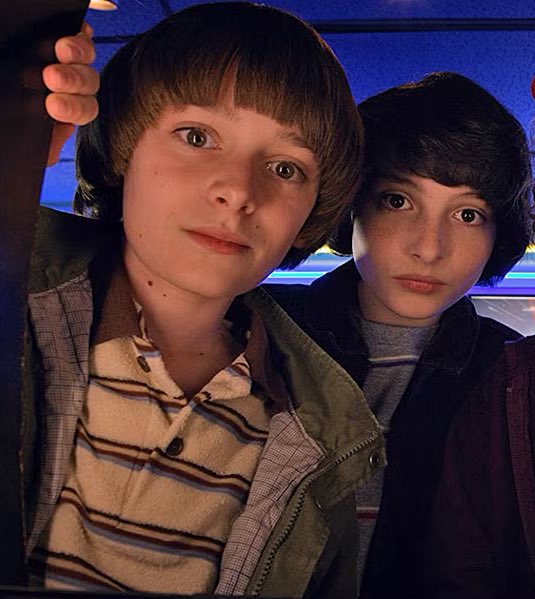 3 gay people staring at each other