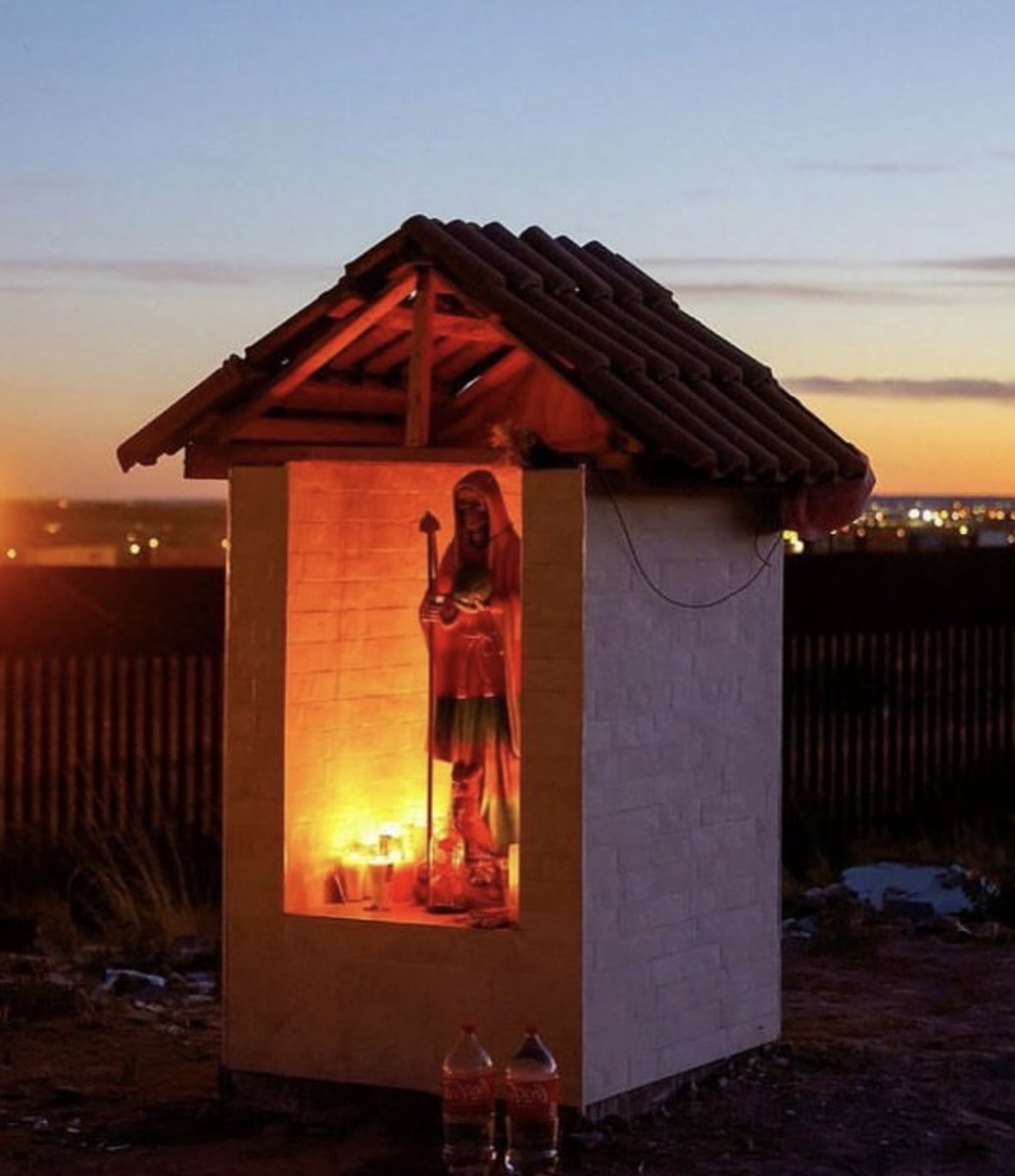 Here’s a shrine for the Santa Muerte on the Mexican side of the US Southern border in the El Paso sector. One of several in the sector. Individuals stop at the shrines pray, make an offering and continue on their pre assigned routes in to the United States. <a href="/TABSReport/">The American Border Story</a>