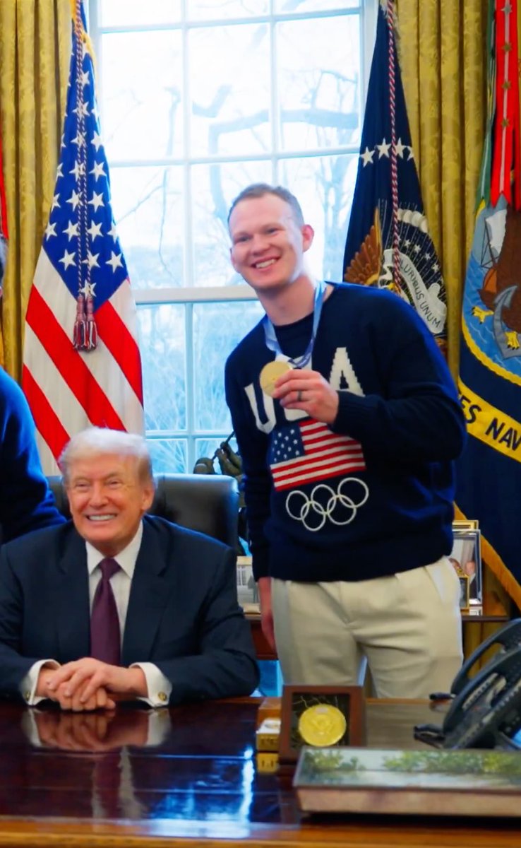 Brady Tkachuk, captain of the Ottawa Senators, smiling with the man who threatens to annex our country.