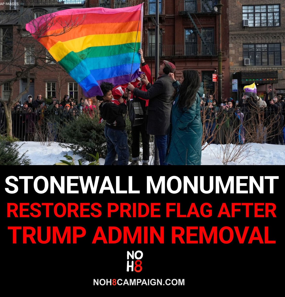 NOH8Campaign's tweet photo. New York City officials and LGBTQ+ advocates re-raise the rainbow flag at Stonewall National Monument in Greenwich Village after it was removed by the Trump administration and replaced with the U.S. flag #NOH8 https://t.co/UEwrsGQwEx