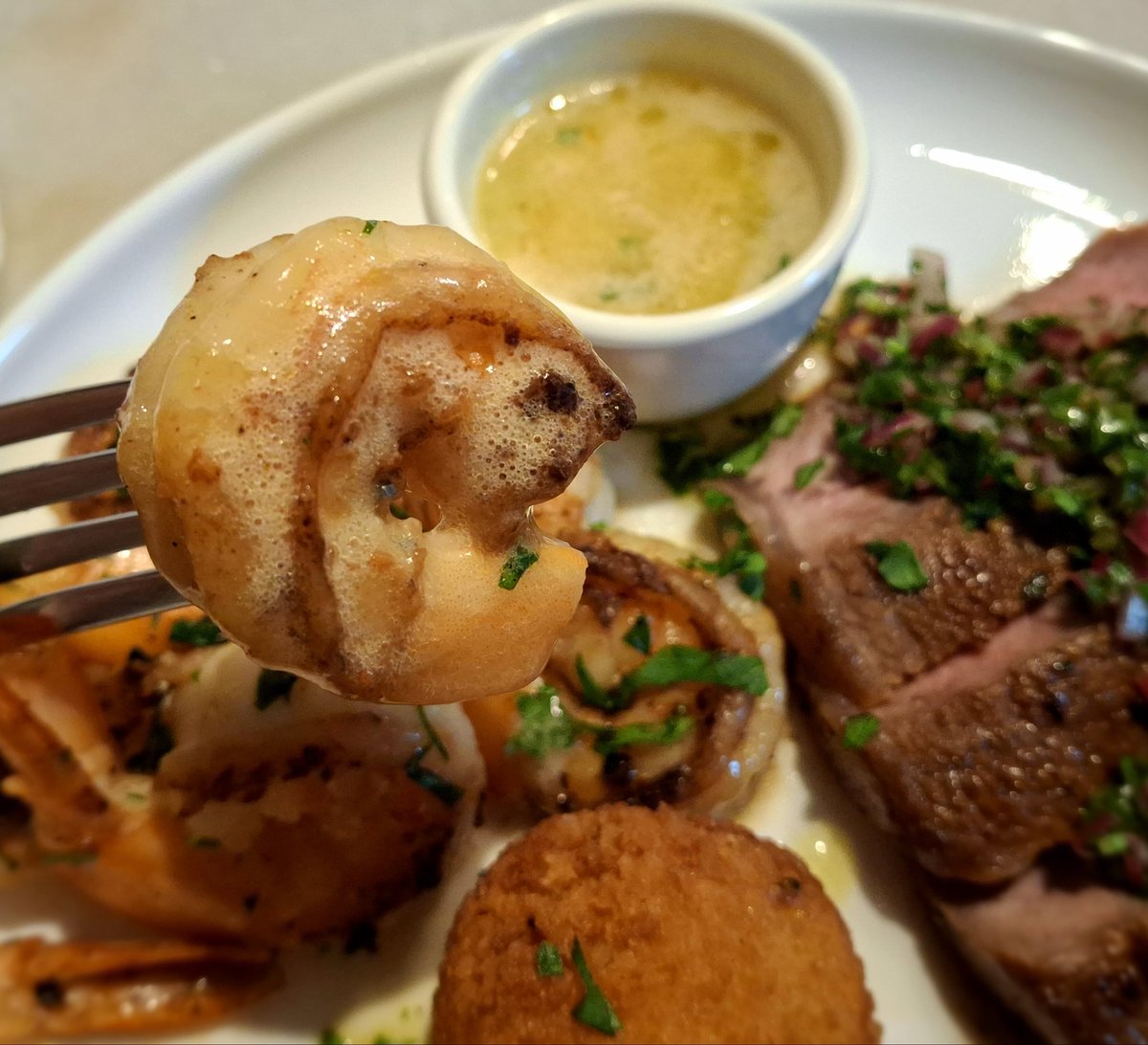 Tonight's dinner is surf and turf!  Pan-seared New York strip topped with chimichurri sauce, grilled shrimp paired with parsley garlic white wine butter sauce, and potatoes croquettes paired with thick creamy ranch sauce. #foodie #foodphotography #homecooking