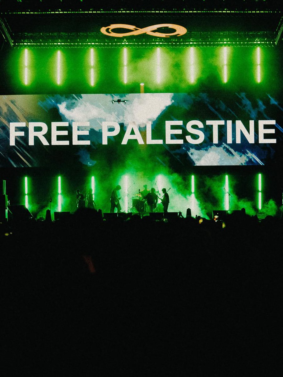 .Feast during their set at a recent show:

“THERE'S NO PEACE IN BOARD OF PEACE. FREE PALESTINE.”