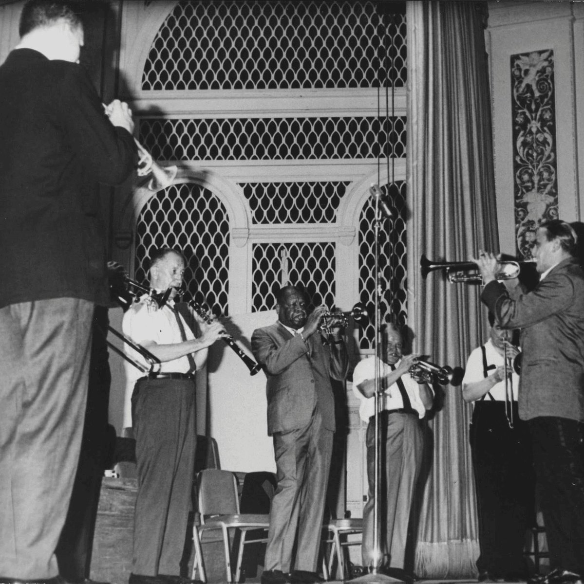 Happy Birthday, Wingy Manone! Born February 13, 1900 in New Orleans, LA. 

Image: Luis Russell, Henry "Red" Allen with trumpet, Billy Butterfield, and Wingy Manone, 1978.118(B).00175