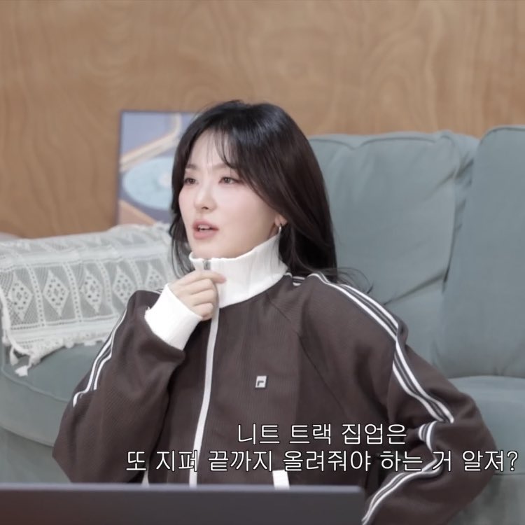 markvenclaw's tweet image. seulgi recommends fila 1911 knit track (as seen on woodz) paired with white pants + loafers for a cozy office look!