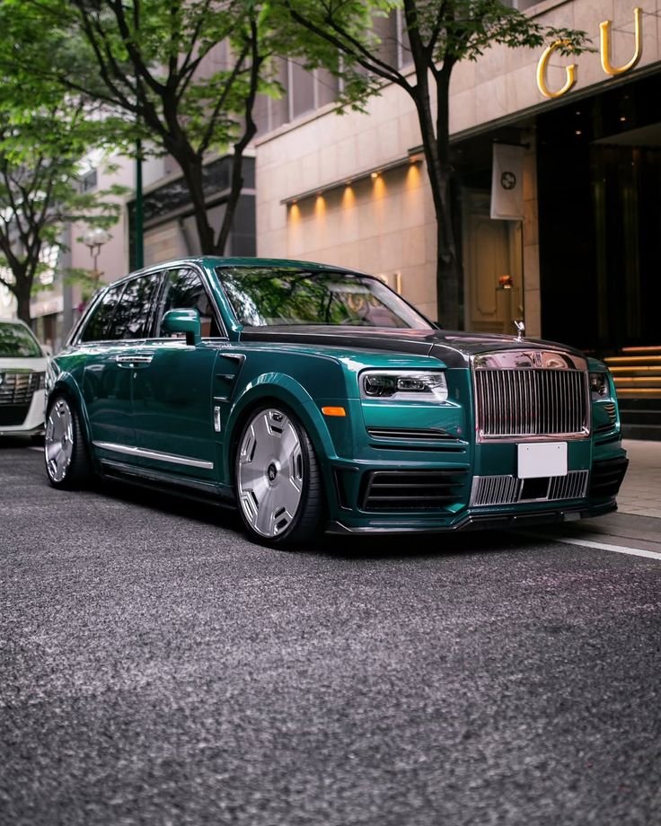 The way that emerald paint catches the city light just hits different. It’s not just an SUV, it’s a moving piece of architecture that happens to have a V12.