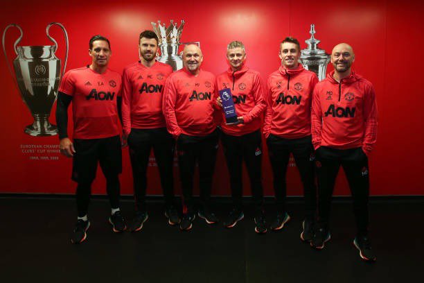 samuelluckhurst's tweet photo. January 2019 and January 2026: Michael Carrick with the manager of the month awards at Carrington #mufc https://t.co/iTvFN7RAqm