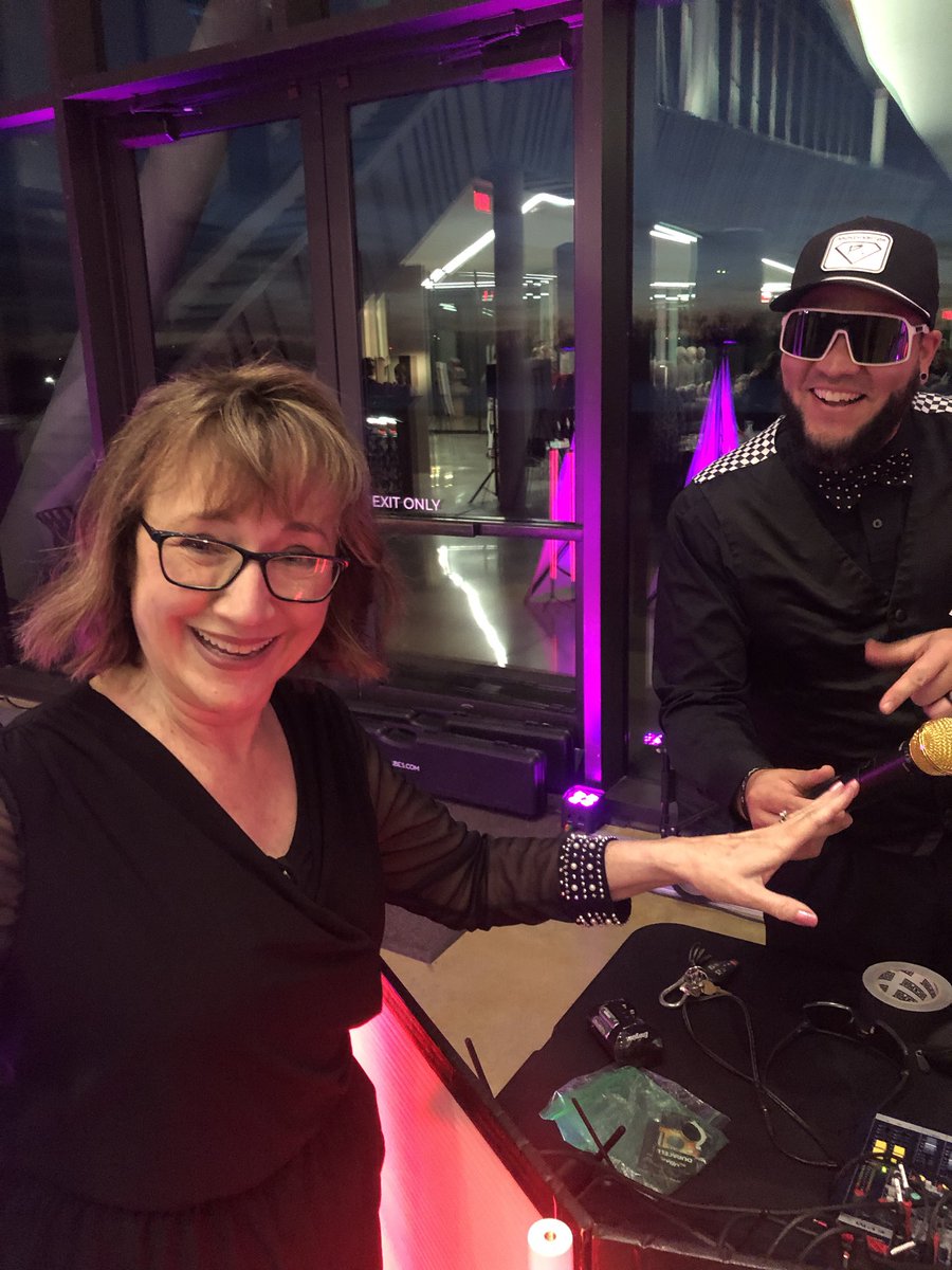 Karen Pharis with Morning in the Fort confers with GrandMaster P during the Crawford County Library Foundation’s “For the Love if Books” fundraiser Feb 7