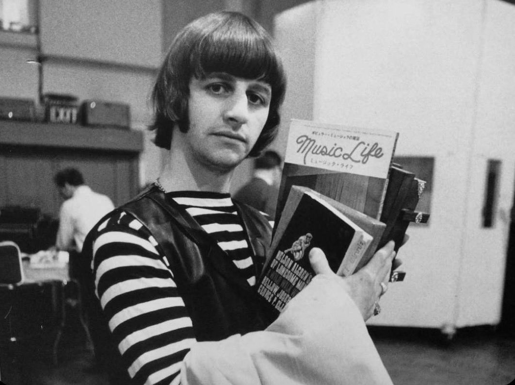 ringo looks like he’s about to audition for the cast of annie