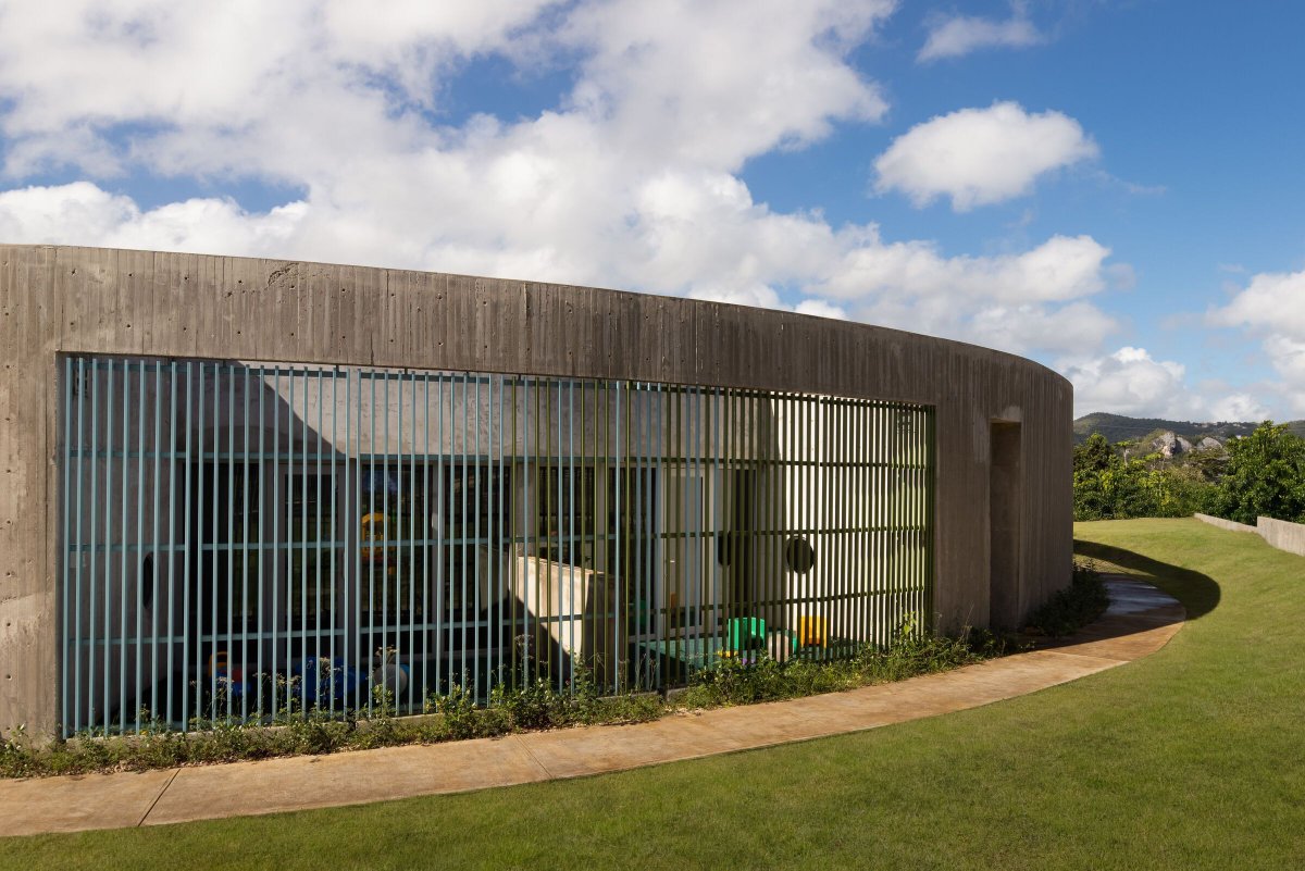 Archello's tweet photo. Ciales Kindergarten transforms a former funeral home site into a circular, exposed-concrete preschool overlooking the Manatí River valley.
https://t.co/nOidH6WJ9A
#ExposedConcrete #CourtyardDesign #ClimateResponsiveArchitecture https://t.co/W5JKlvvii1