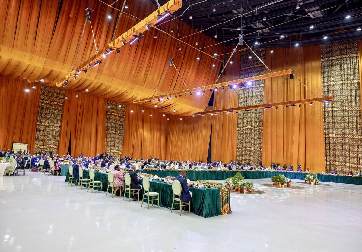 PrimatureRwanda's tweet photo. This evening at the Addis International Convention Centre in Addis Ababa, Prime Minister Nsengiyumva attended the second Italy–Africa Summit, held on the margins of the #39thAUSummit.

He later joined fellow leaders at a dinner hosted by Abiy Ahmed in honour of participants of the #39thAUSummit.
----------------------
Kuri uyu mugoroba, muri Addis International Convention Centre i Addis Ababa, Minisitiri w’Intebe Nsengiyumva yitabiriye Inama ya kabiri ihuza Ubutaliyani na Afurika (Italy–Africa Summit), yabaye mbere y'Inama ya 39 isanzwe y’Umuryango wa Afurika Yunze Ubumwe #39thAUSummit.

Nyuma y’iyo nama, Minisitiri w’Intebe n'abandi bayobozi bakuru bakiriwe ku meza na Minisitiri w’Intebe wa Ethiopia, Abiy Ahmed.