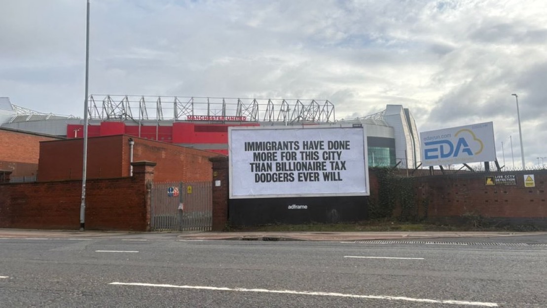 🚨 𝗕𝗥𝗘𝗔𝗞𝗜𝗡𝗚: A billboard outside Old Trafford following Sir Jim Ratcliffe's comments:

 "Immigrants have done more for this city than billionaire tax dodgers ever will."

— <a href="/samuelluckhurst/">Samuel Luckhurst</a>
