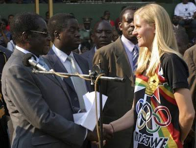 tribunaua's tweet photo. IOC in CAS said that @heraskevych's helmet is political, because Vladyslav supported Ukraine in his interviews, and @ZelenskyyUa awarded him Order of Liberty

Below you can see Ms. Coventry being awarded by Zimbabwean dictator Mugabe for 2008 Olympic gold – was it political too? https://t.co/ph5VXuXPfl