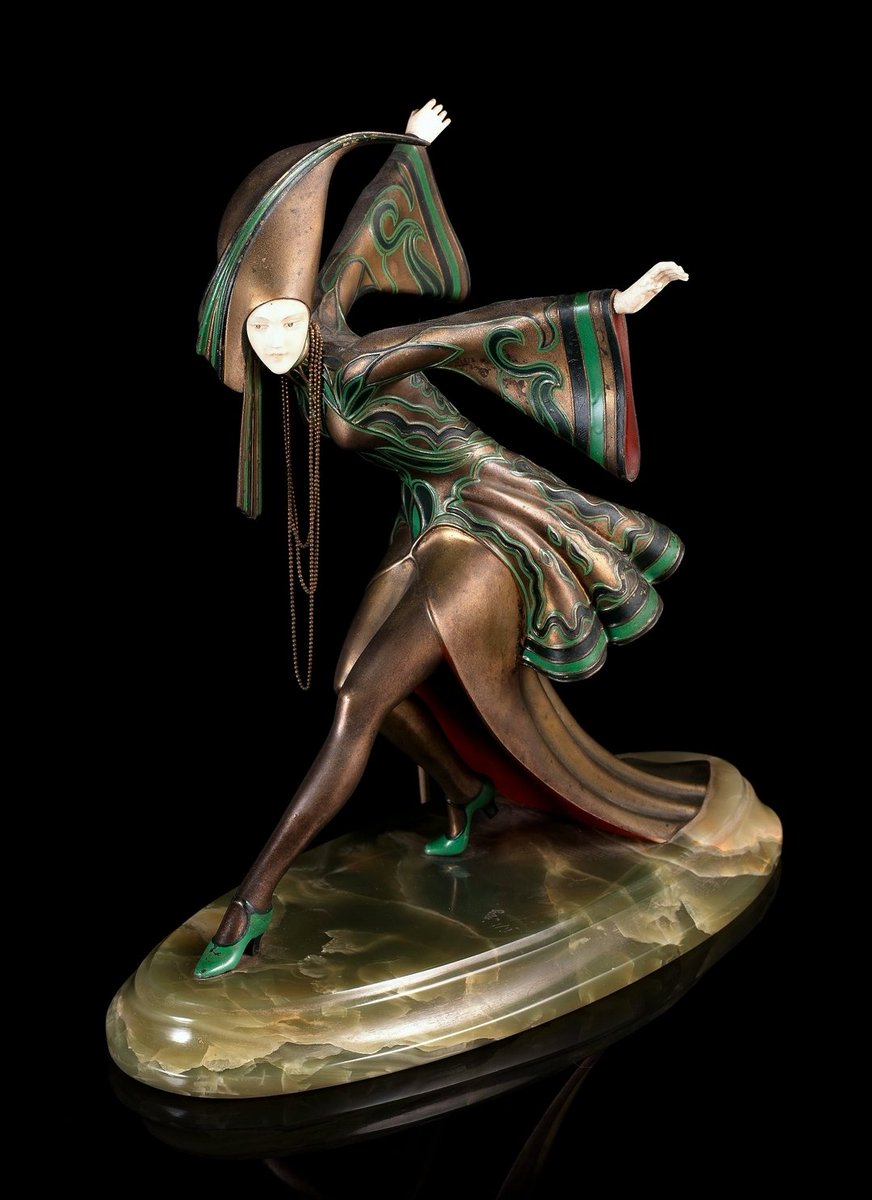 "Exotic Dancer" circa 1925.

Cold painted Bronze and carved Ivory sculpture by Gerdago, also known as Gerda Gottschlich.

Gerda was an Austrian costume designer for film and theater, as well as an Art Deco sculptor.