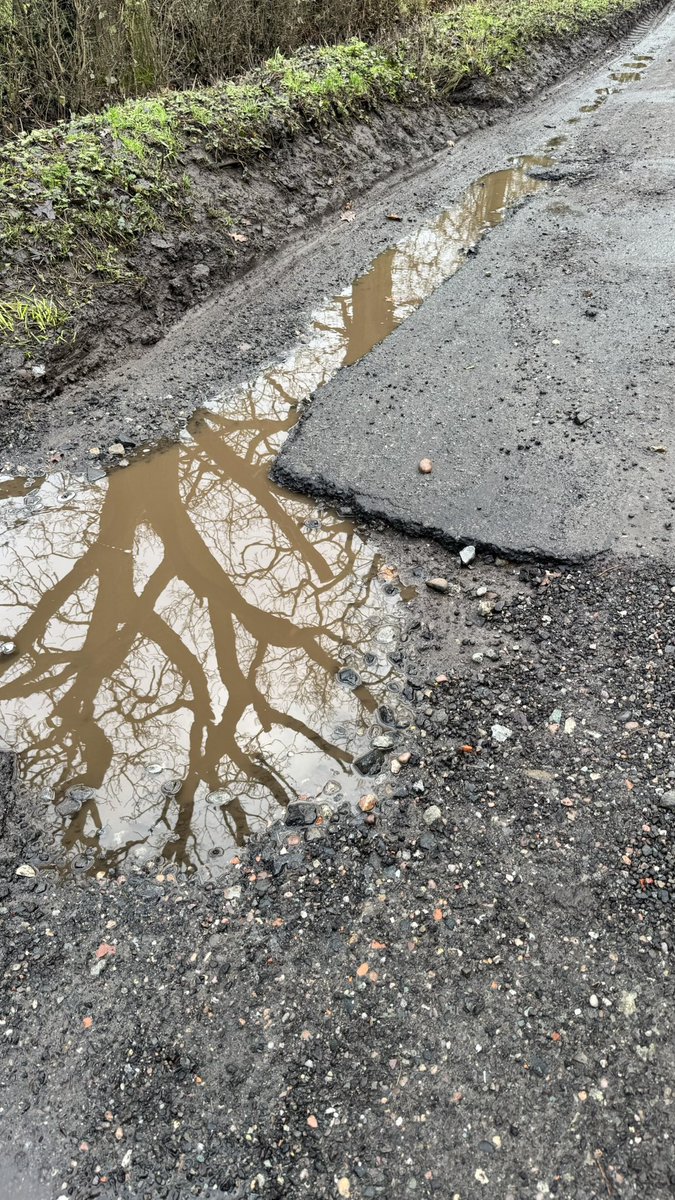 jpmercer's tweet photo. @BBCWatchdog just wondering if you’d like to do a story on potholes in Staffordshire and how little SBC actually do about it. 76 in 1/4 mile on my lane. Couple of samples to try and negotiate every day. https://t.co/4FO2hxiHwv