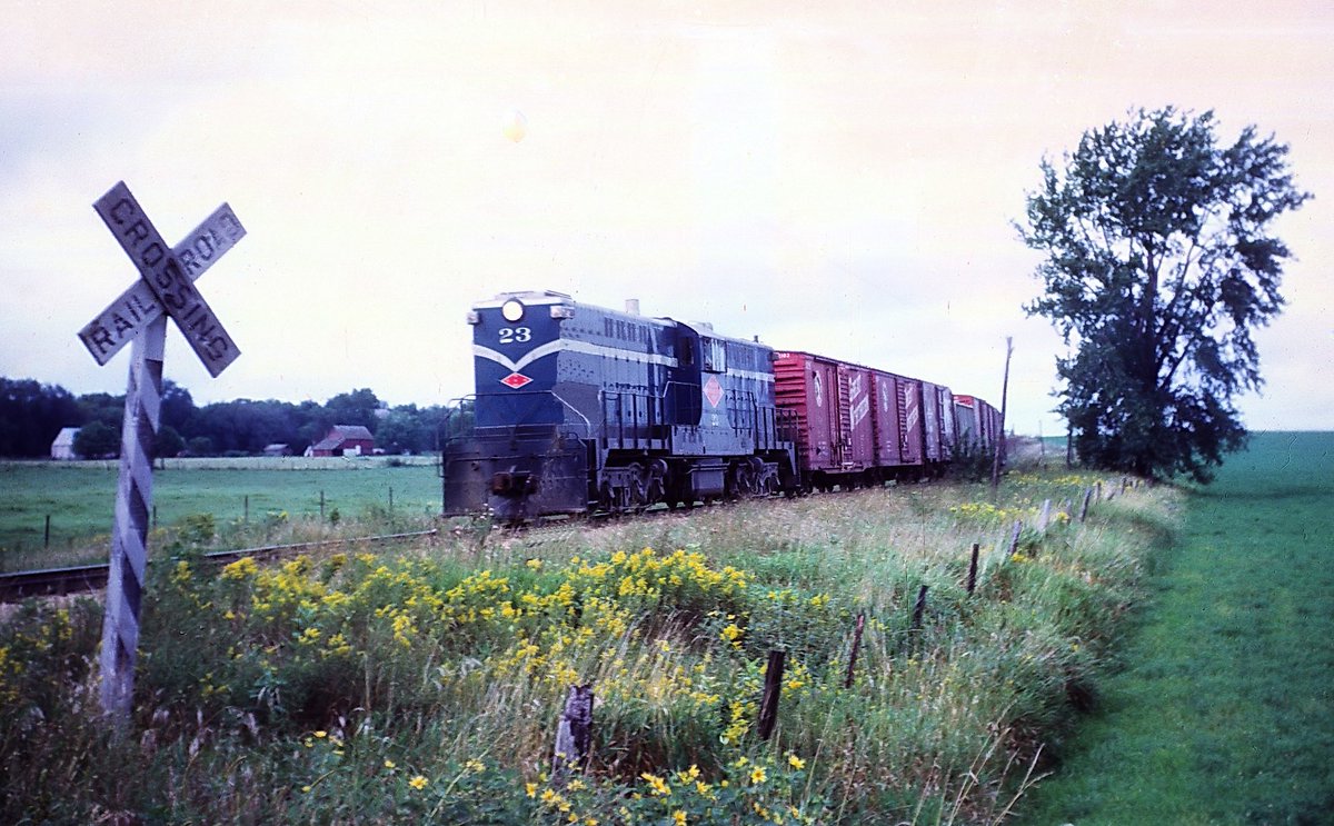 One of Minneapolis, Northfield &amp; Southern's big Baldwin DT-6-6-2000 centercabs, #23, in freight service near Northfield, Minnesota on August 31, 1962. Rick Burn photo.

american-rails.com/minneapolis.ht…