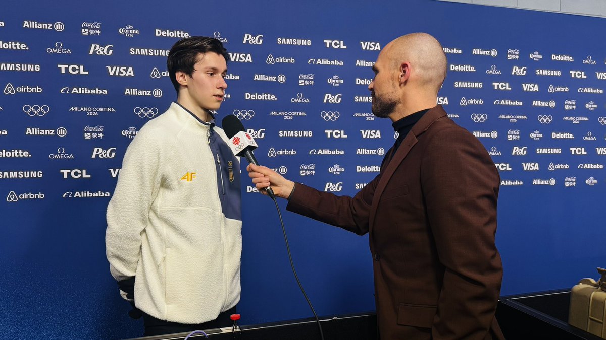 Devin_Heroux's tweet photo. Ukrainian figure skater Kyrylo Marsak’s father is on the frontline of the war. 

But he tells me his dad was able to watch his short program — and then called his son to say how proud he was.

Kyrylo called the decision to ban Vladyslav Heraskevych “disgusting” in our interview. https://t.co/7bcXpvNBmK