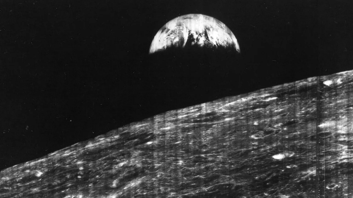 spaceHistorian's tweet photo. Lunar Orbiter 1 captured the first photograph of Earth from lunar distance in 1966 — a grainy but historic “Earthrise” precursor. When the Lunar Gateway is operational, we’ll receive 4K+ streams of Earth from cislunar space every day. Old wonder → constant clarity. 🌎📸 #Moon #Artemis