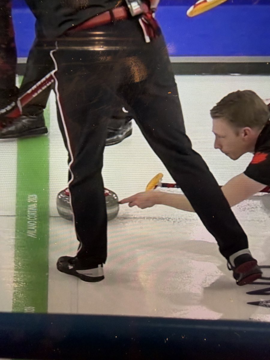 __ashima's tweet photo. Mark Kennedy of @TeamBradJacobs
 is touching the granite after letting go of the handle, which is clearly stated in the rulebook as forbidden.

CHEATER AND FUCKING FRAUD
#Curling #MilanoCortina2026 https://t.co/YwtPZPZdTe