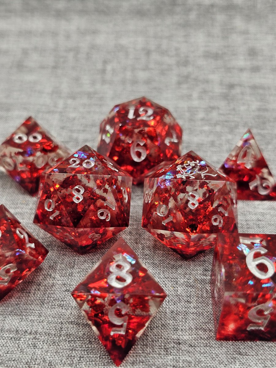 blackdragondice's tweet photo. Valentine's Day is tomorrow, and this is the closest thing I have to "Valentine's Day dice"! 😂  So here they are: Blood &amp; Ruby Dice Set, available now at https://t.co/wXGQBmLAy8!

Follow @blackdragondice for more!

#dnd #dice #dicemaking #valentinesday #smallbusiness https://t.co/B0rquWLGnC