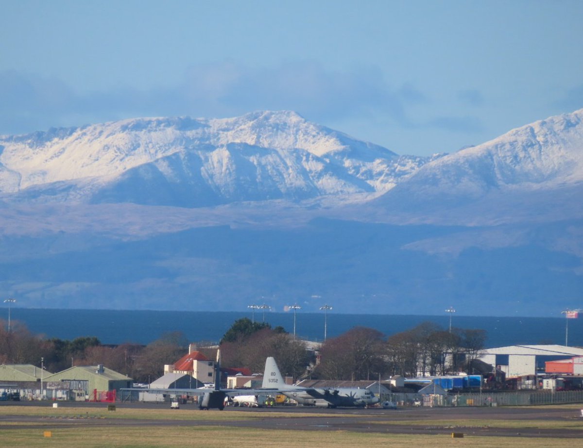 BloodyPolitics's tweet photo. I went out and snapped the snow-capped mountains of Arran this morning. I didn't realise until now that I'd captured 2 x RCAF ๐จ๐ฆ C130s and 1 x US ๐บ๐ฒ C130. Result. ๐ https://t.co/HwzOW4sD0q