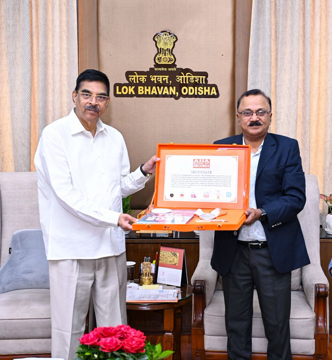munarajat's tweet photo. A precocious moment  with Hon Governor sir at Lok Bhavan presenting the Asia book of Records of the “”Protocol type model of Rafael made out of scrap materials https://t.co/PCLnsAPz5q