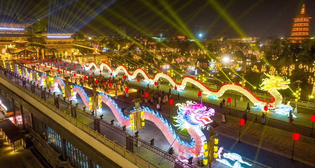 This aerial drone photo taken on Feb 12, 2026 shows tourists viewing #lanterns and lighting installations at a scenic area in #Luoyang, Central #China's #Henan province. 
Various festive events are held across China to celebrate the upcoming #ChineseNewYear of the Horse.