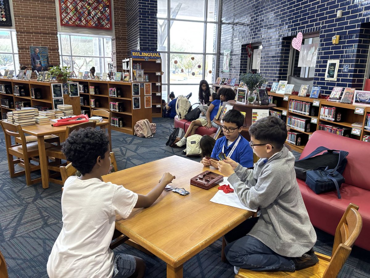 pomslibrary's tweet photo. The @pinoakms library is alive with activity, from gaming to paper crafts and even dance practice! #livinglibrary #chargersread 📖 🃏🎶 https://t.co/daGEPdaDPJ