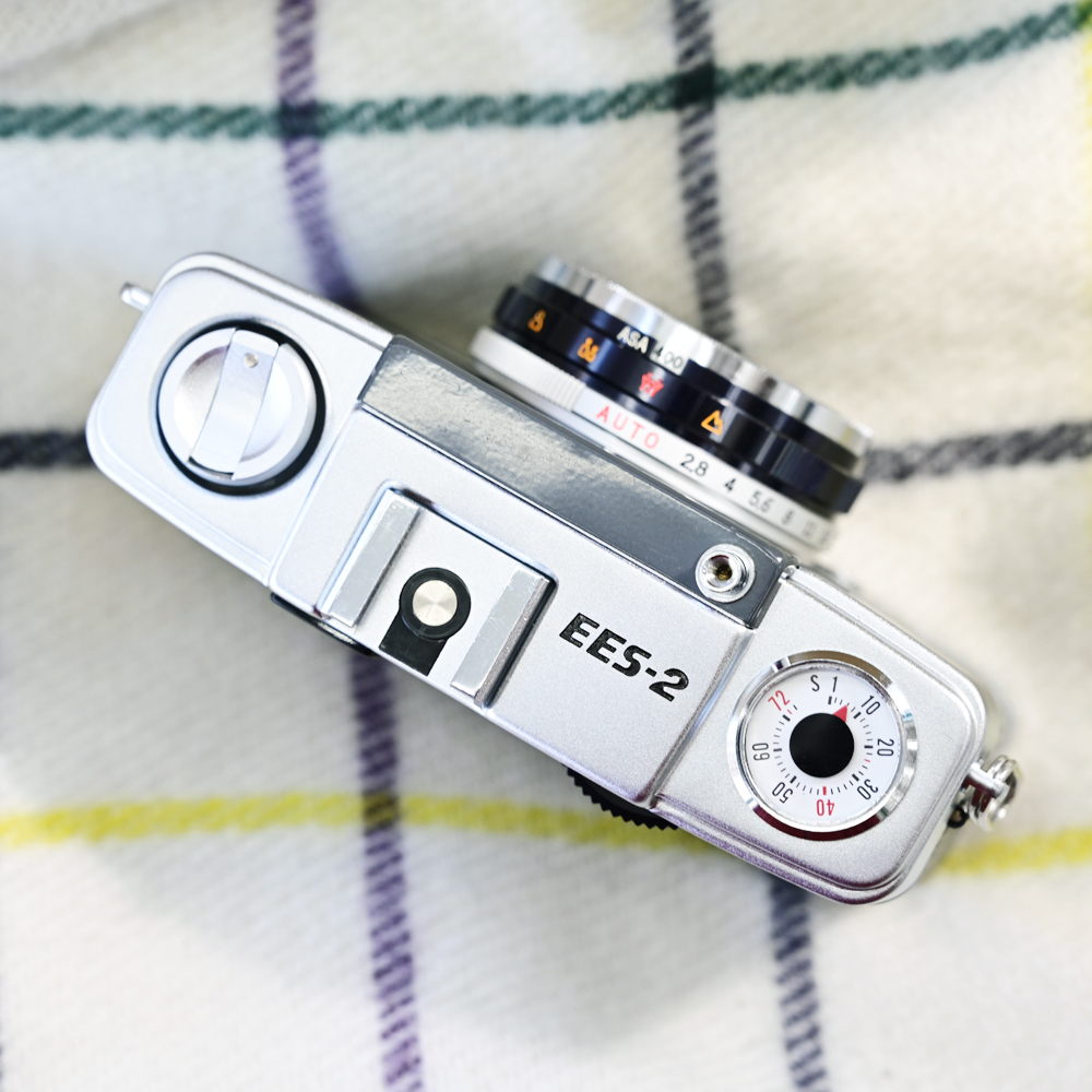 champcamera's tweet photo. OLYMPUS PEN EES-2[整備済] ￥25,000- by #青葉台 店

使いやすさと完成度の高さで大人気な #フィルムカメラ『ペンEES-2』
EESにはなかったホットシューが追加され、ゾーンフォーカスも4段階＆フィルム感度もISO400に対応可能に✨
こちらオーバーホール済みです📷

#PENEES2 #田園都市線
https://t.co/WouMg4SS8z