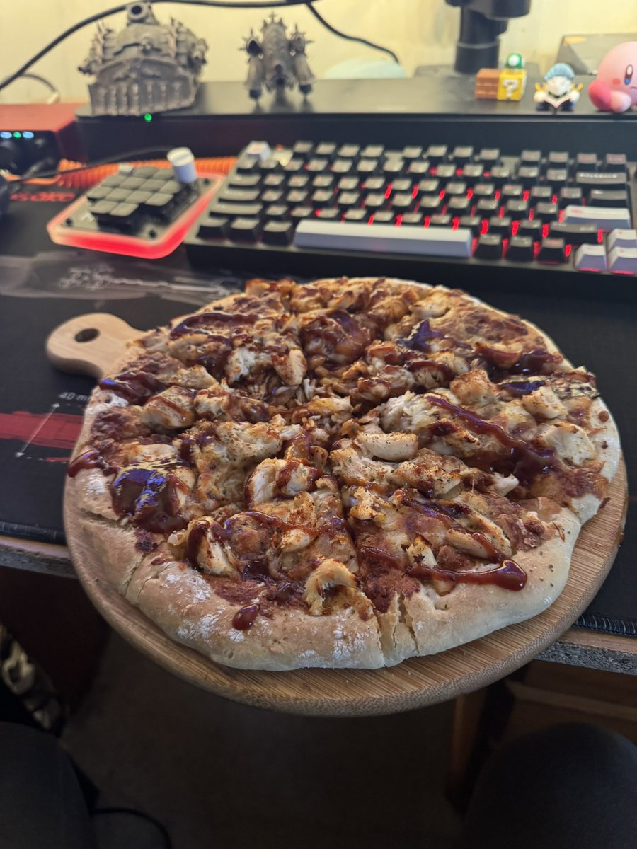 SpammyDami's tweet photo. garlic knots, and pizzas (one slightly burnt) from scratch i made recently https://t.co/8ciVqXP6vO