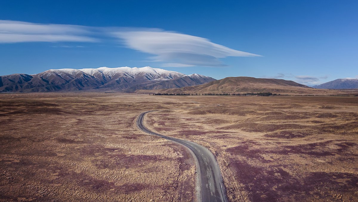 From the City Limits to the World Unmade 

 Landscapes like this are shaped by extremes. 

It will take the curious ones, gliding on the thin ribbon of human contribution, towards the distant hills and their weightless, almost deliberate cloud. 

#landscape #photographer #travel