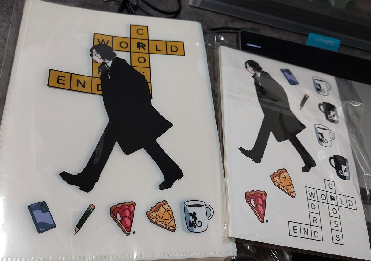 新刊セットのクリアファイルとシール。 クリアファイルは表だけ透け