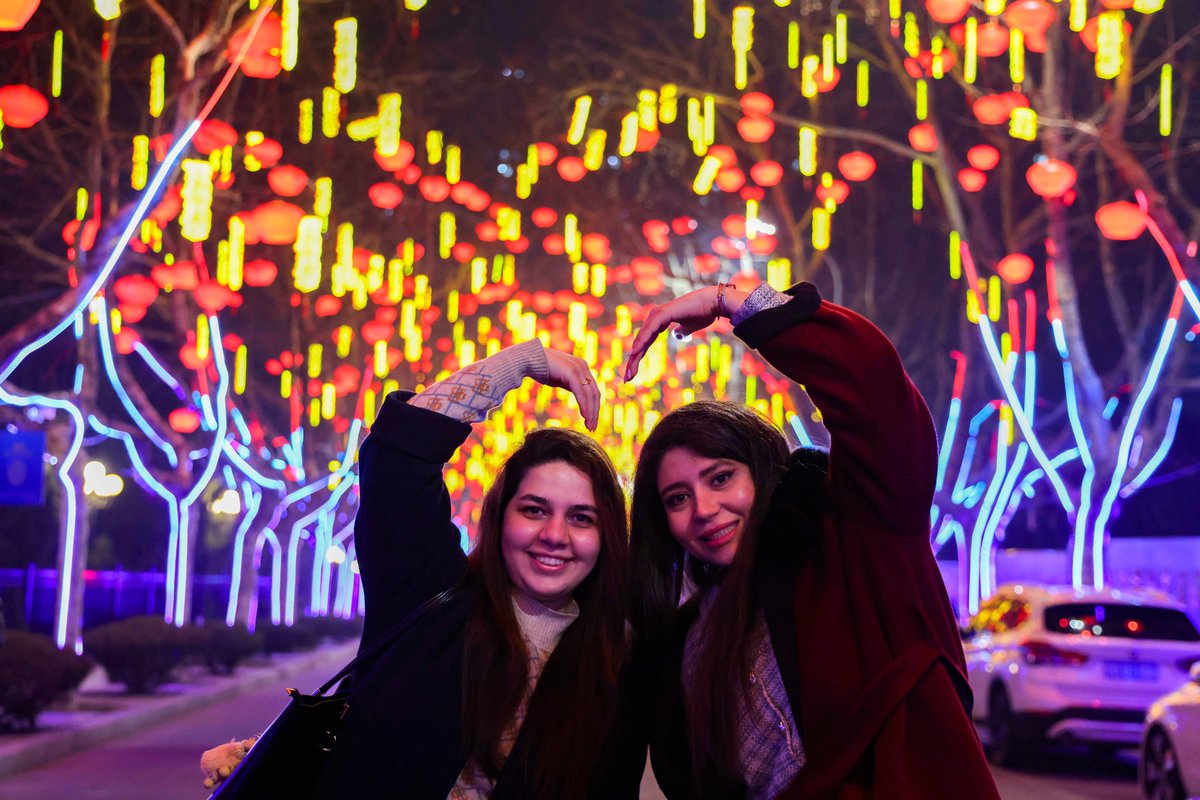 TouchShandong's tweet image. Fengshan Road, West Coast New Area of #Qingdao, Shandong Province, is ablaze with dazzling lights. The Horse-themed #lantern #show has drawn large crowds of Chinese and #international visitors.