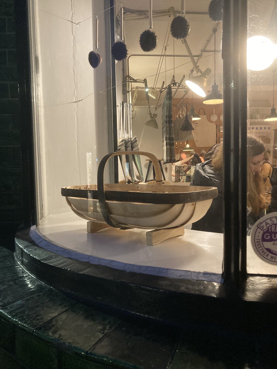 Traditional handcrafted Sussex trug in the window of Labour and Wait on Redchurch St, London. Herstmonceux in the Sussex Weald is home to this craft and has a long history of trug making. A garden must-have. #sussextrug #herstmonceux #sussexcraft