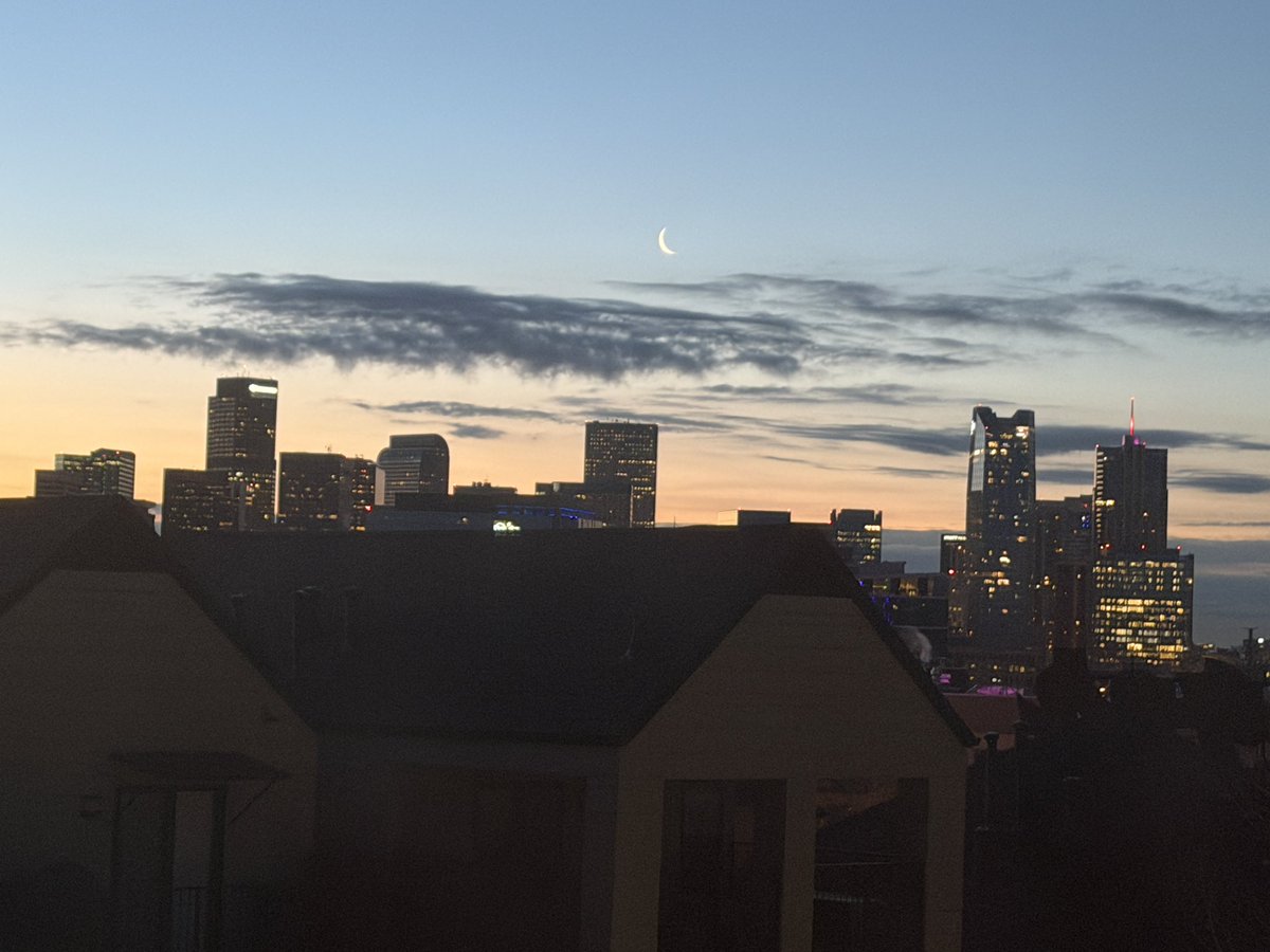Waning moon at sunrise in Denver - so pretty! #cowx #weather