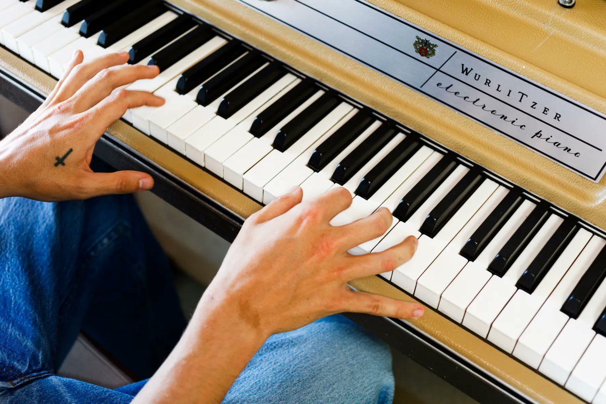 Harry playing the piano in Italy for The Times.

Photographed by Martin Parr.