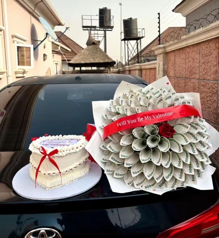 My neighbor’s yahoo boyfriend who stays in Uyo came to her house yesterday night for Valentine’s Day. He got her plenty gifts, flowers and money bouquet, everyone in the compound were just shouting awww 🥰 for them. 

This morning, her sugar daddy sent his driver to bring new