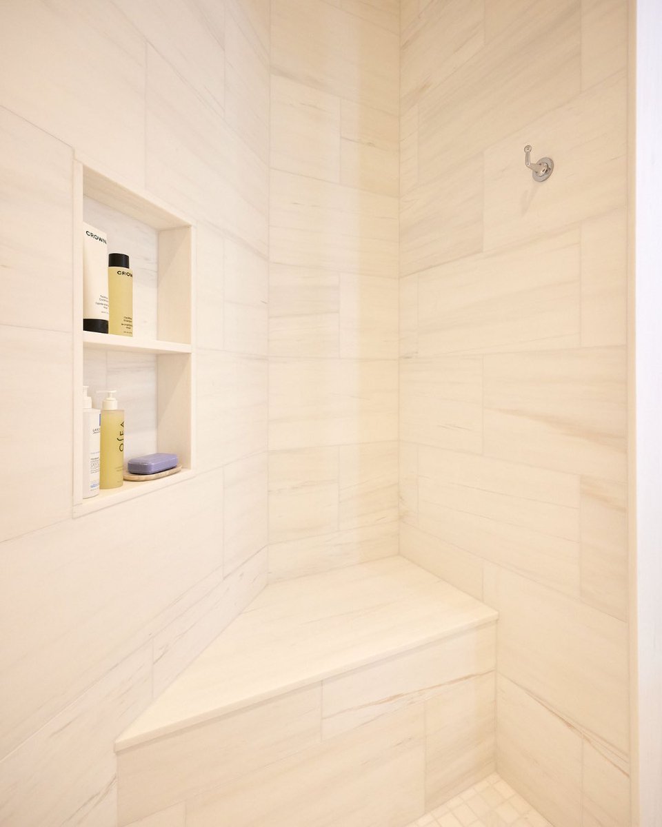 theodellgrp's tweet photo. When a shower feels like sanctuary: stone textures, integrated storage, and timeless fixtures make wellness part of every day. #ODGxHiddenHillRoad #ShowerDesign 📸: @juliadags22 https://t.co/0TMVWW8rZM