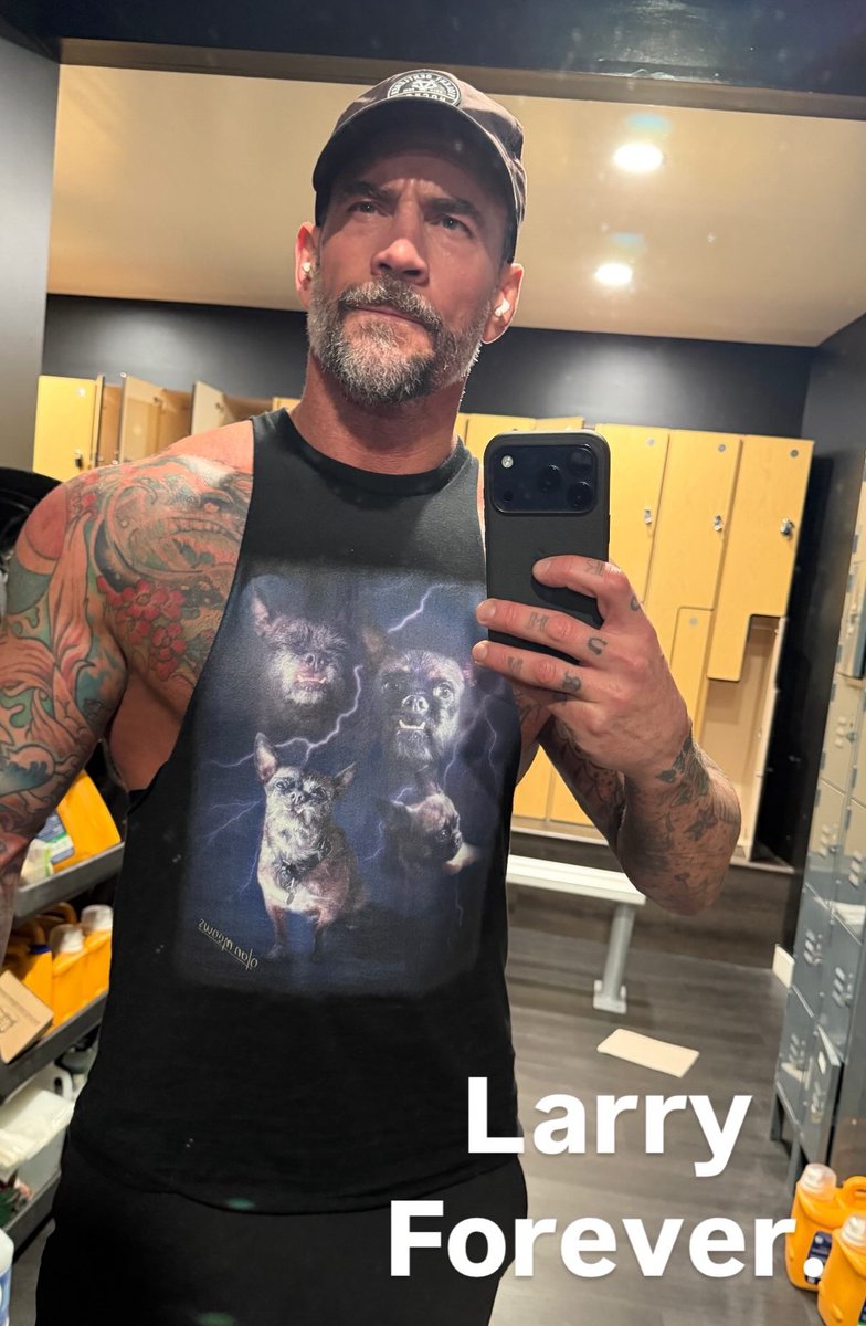 CM Punk rocking a Larry shirt 🐾