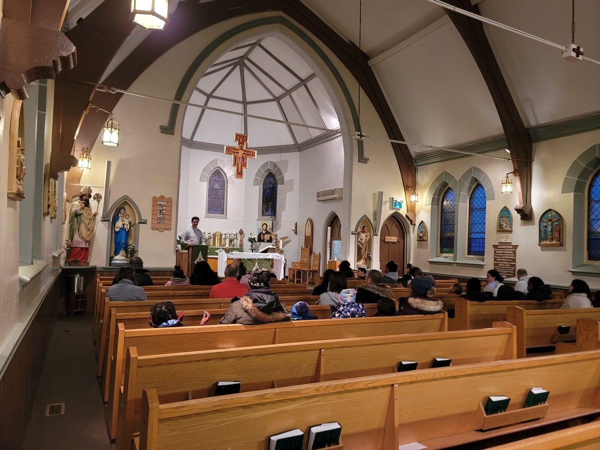 Father Cole with our first Communicants and their families: "Sins, bad things that we know are bad that we still choose to do anyway, hurt us because they make us something that God did not create us to be!"