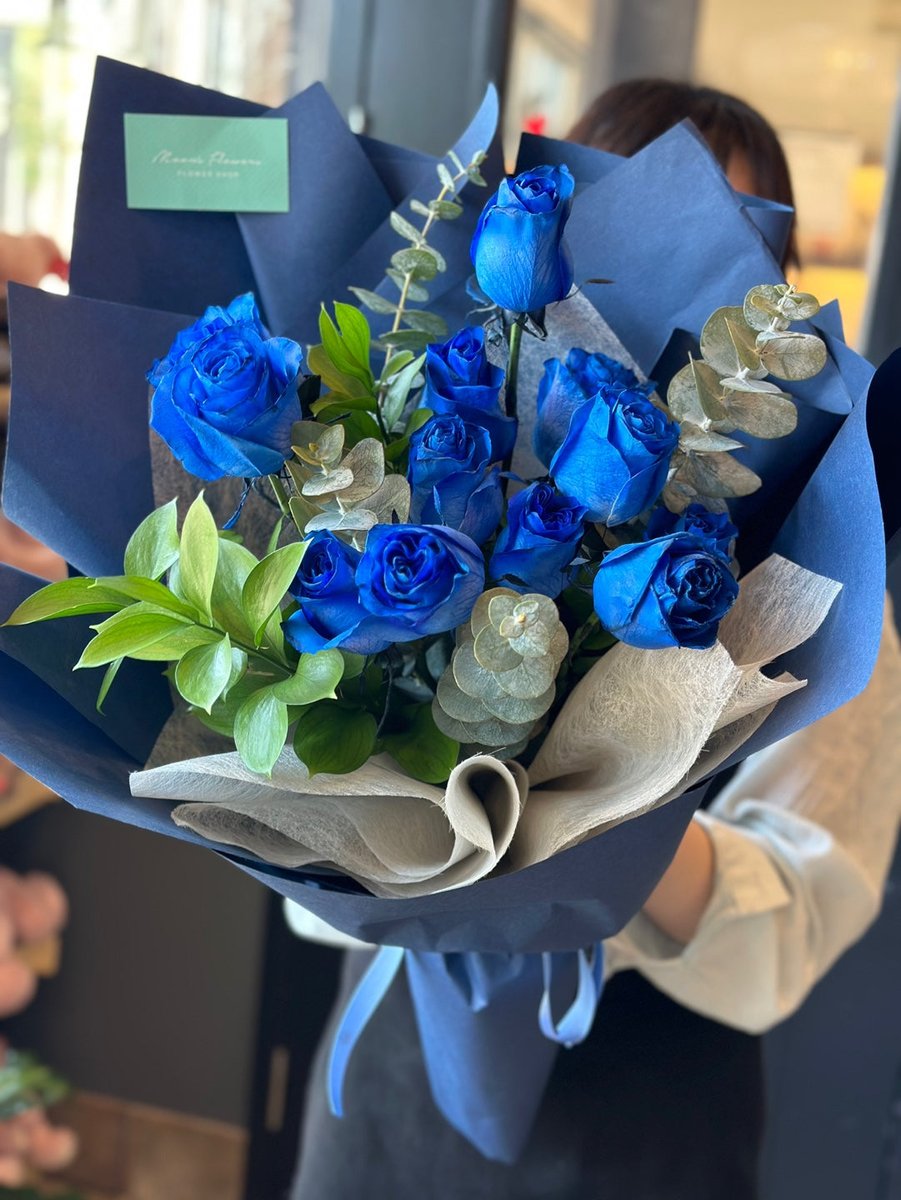 "Aqua" 

Playfully did the male pull the classic 'Item behind your ears' magic trick, motioning his hands behind Aqua's blue hair before turning a single strand of it into a bouquet of blue flowers. 

"You celebrate Valentines Day where you're from?"